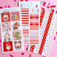 Sticker kit with cartoon characters and daily planner stickers on a pink background
