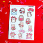 Sheet of Valentine-themed stickers with cartoon animals on a red background with confetti.