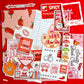Collection of 'Spicy Book Club' themed stickers and paper items on a red background.