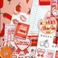 Collection of 'Spicy Books' themed stickers and book club cards on a red background.