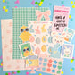 Collection of Easter-themed stationery items on a colorful background
