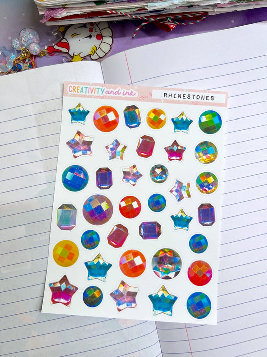 rhinestone stickers on a notebook background