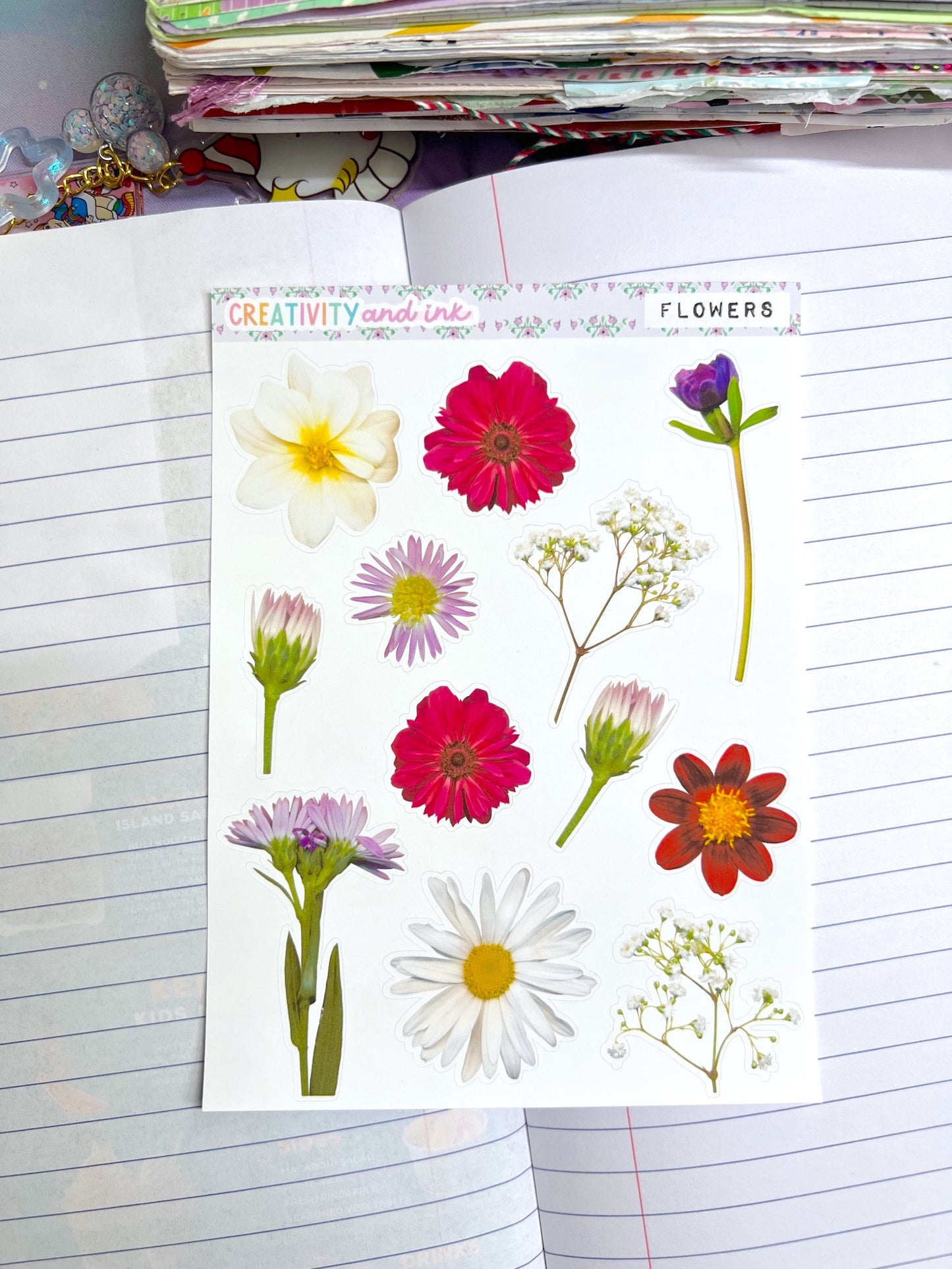 Sheet of floral stickers on a notebook page with 'Creativity' and 'Flowers' text.