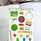Sticker sheet with sewing supplies on a notebook page