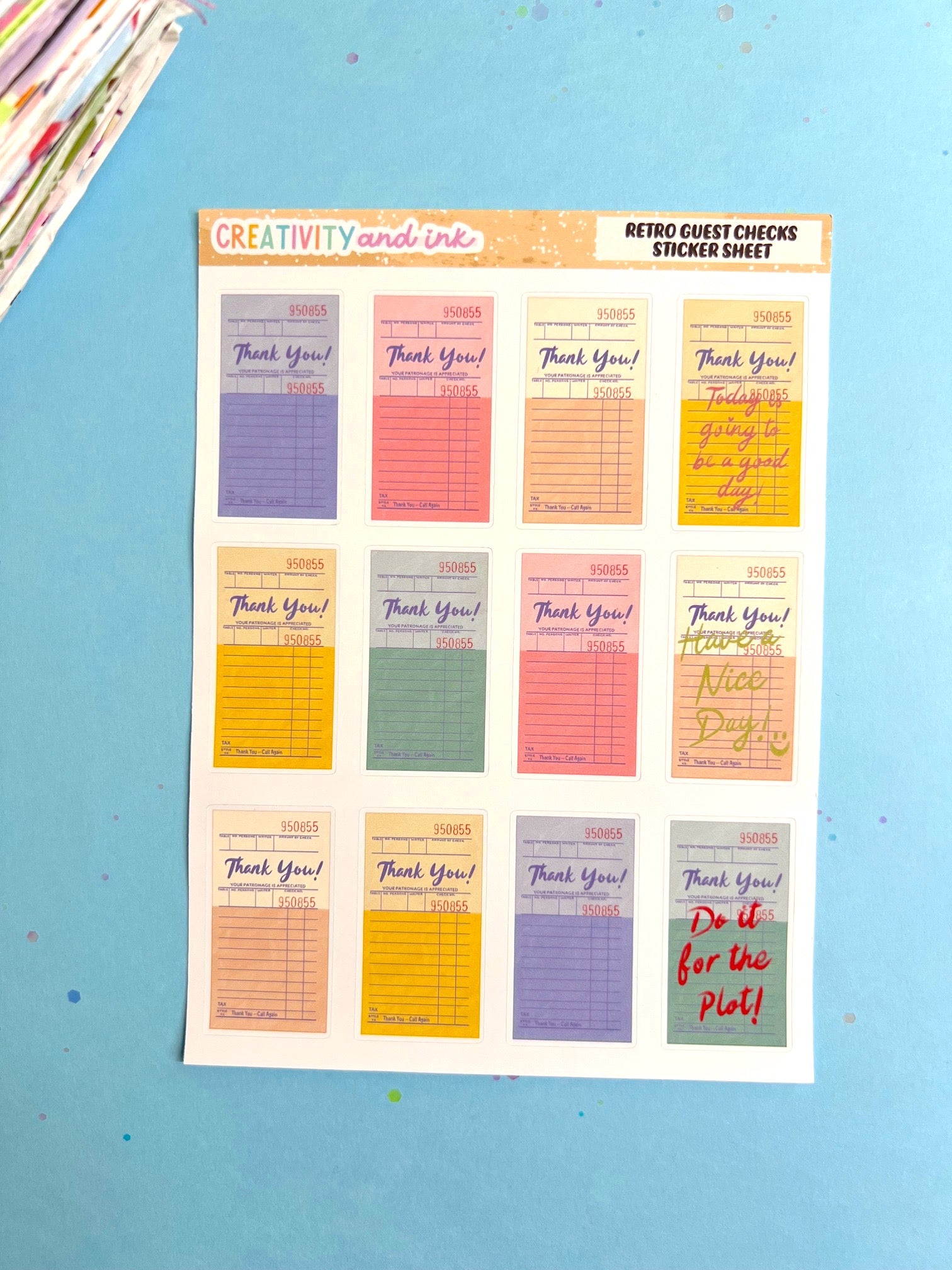 Sheet of colorful stickers with text on a blue background
