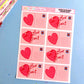 Sheet of 'I Love You' and heart-shaped stickers on a blue background