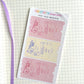 Sheet of mini cafe receipts on a grid notebook with a blue background