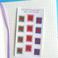 mini little stamp stickers that have a bear on them as a sticker sheet on a notebook background