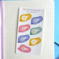 mini glue tape runners as a sticker sheet on a notebook background 